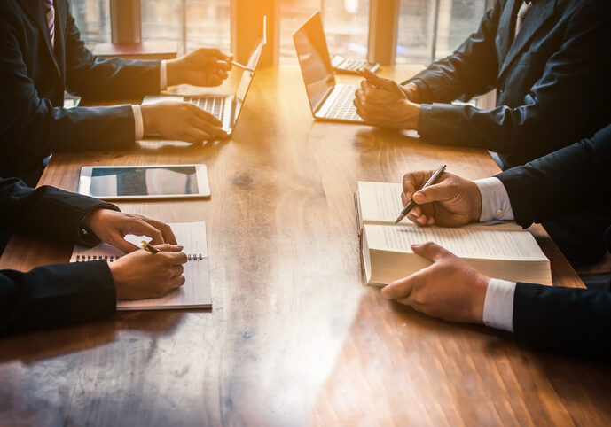 Lawyers assist clients in mediation