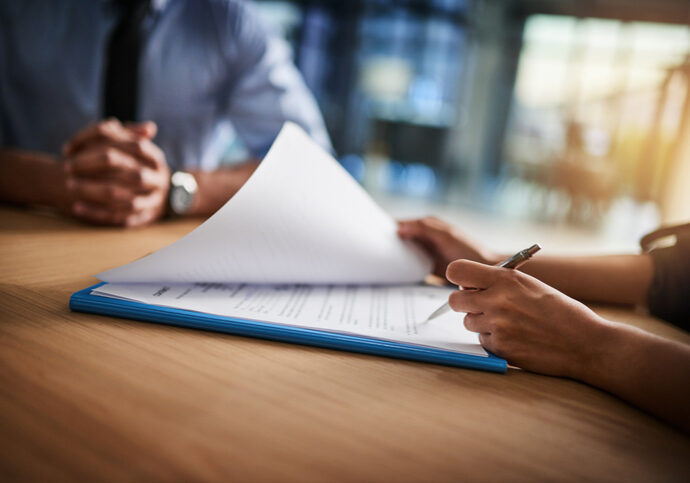 Woman preparing documents for signatures